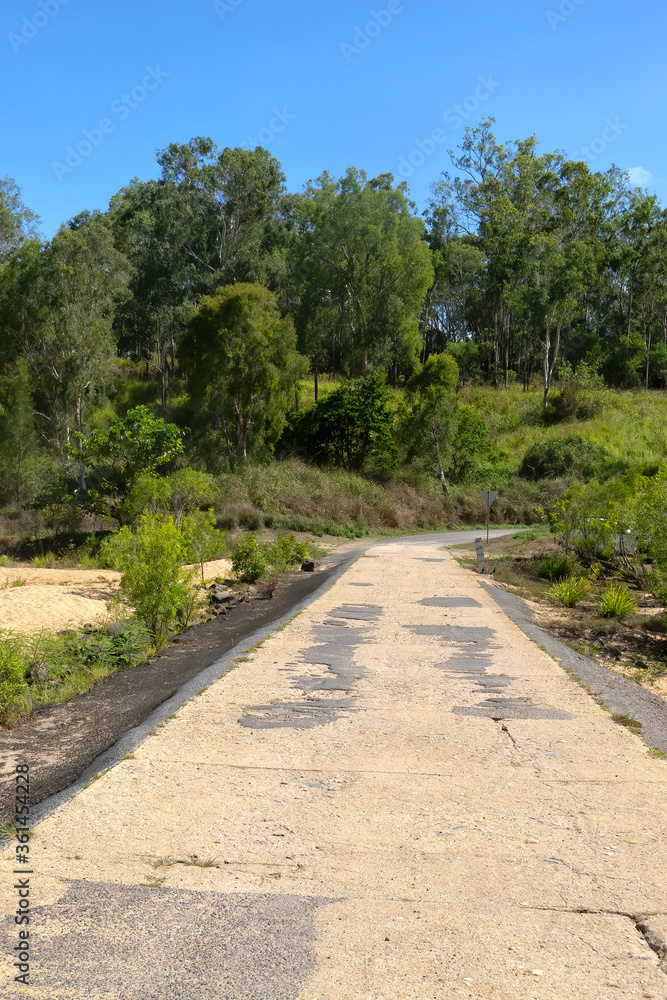 Run-down concrete causeway on the Barron River near Kuranda in Tropical North Queensland, Australia
