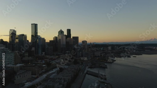 Aerial View of Downtown Seattle Skyline at Dusk with Mount Rainier in the Distance, Clear Sky photo