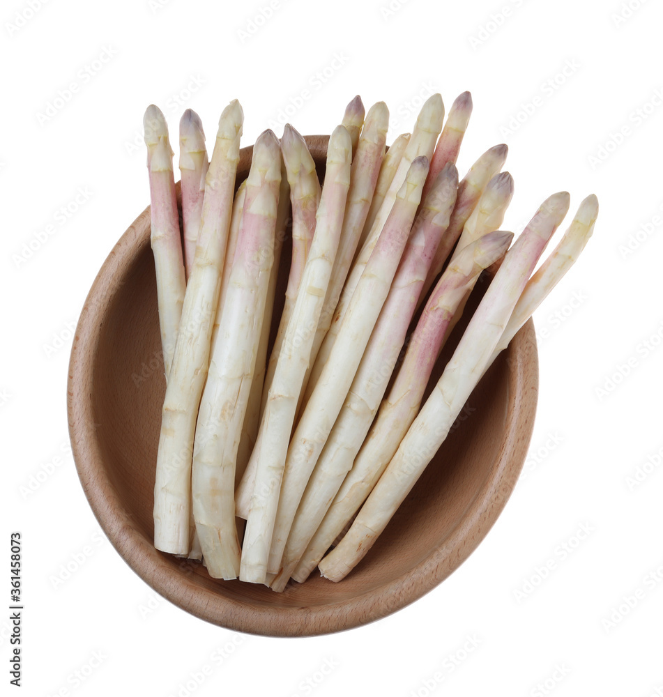Fresh ripe asparagus in bowl isolated on white, top view Fresh ripe asparagus in bowl isolated on white, top view