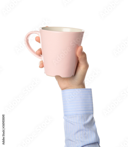 Woman holding pink cup on white background, closeup