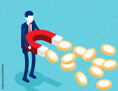 Businessman holding magnets to attract gold coins. Business wealth