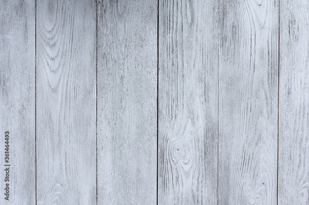 Fototapeta premium White hardwood background, blank copy space with vertical painted planks, wooden texture, table top for surface. For design in rustic or rural style