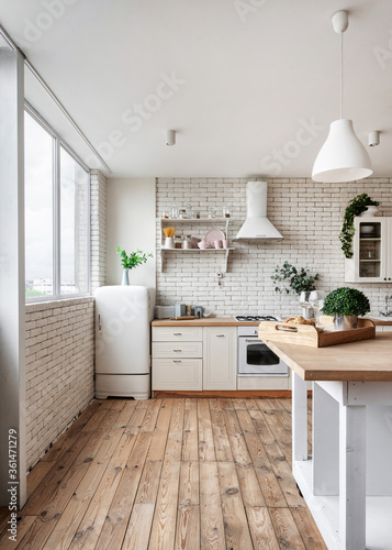 Kitchen at modern house with white interior design © brizmaker