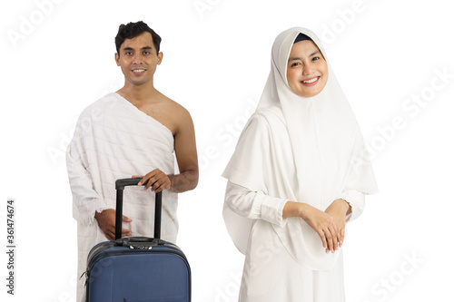 Canvas Print beautiful muslim pilgrims hajj and umrah couple