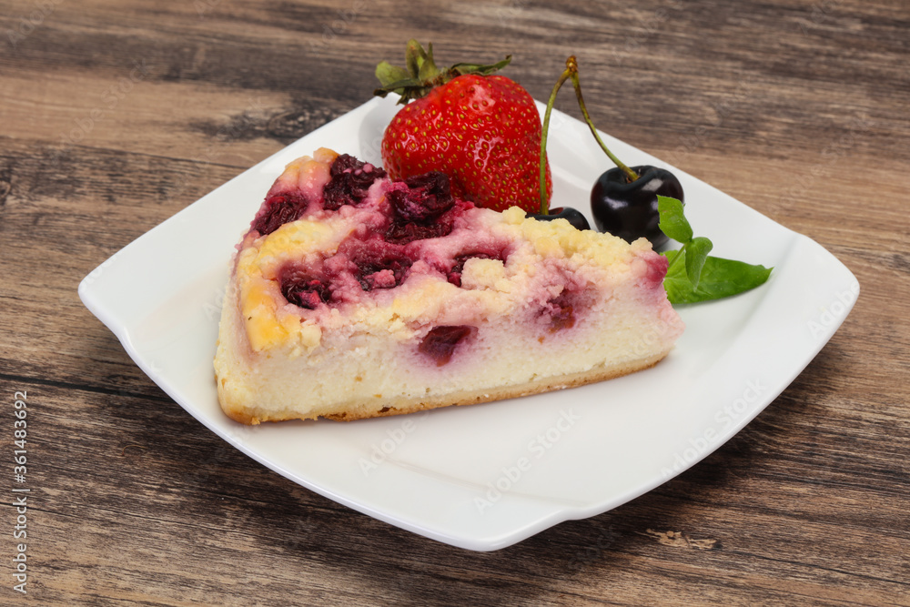 Cheesecake with cherry served strawberry Cheesecake with cherry served strawberry