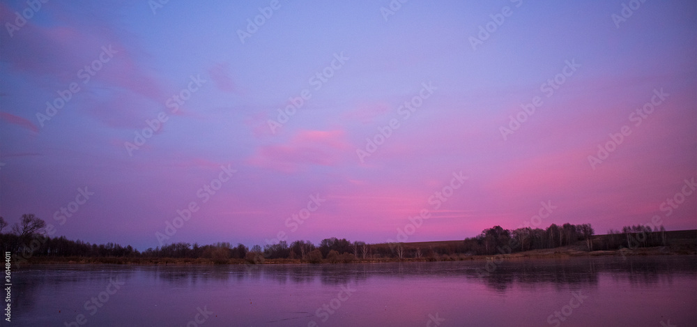 Fototapeta premium sunset over the river