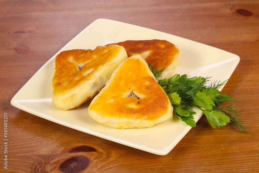 Homemade Pie with meat and onion Homemade Pie with meat and onion