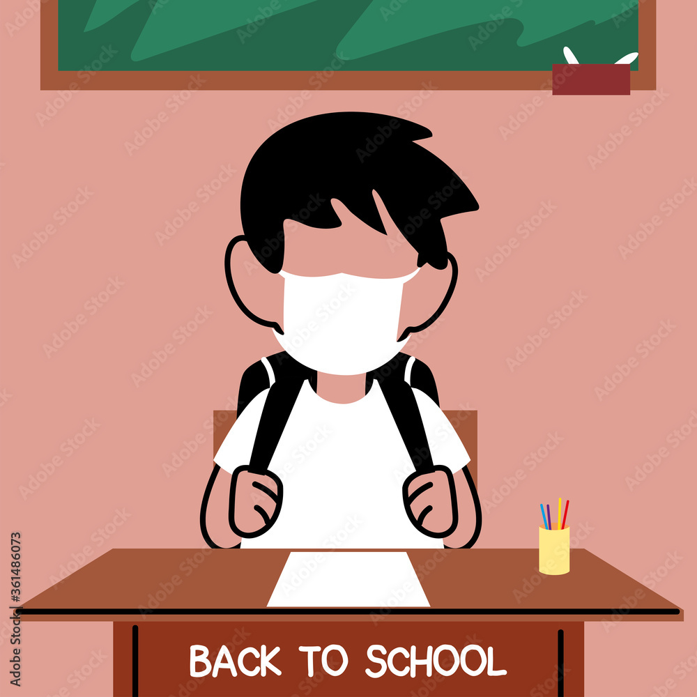 back to school, boy studying in classroom with face masks
