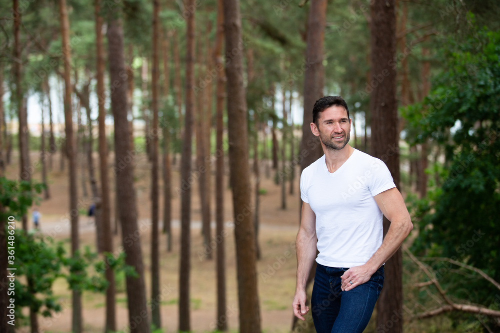 young man in the forest young man in the forest