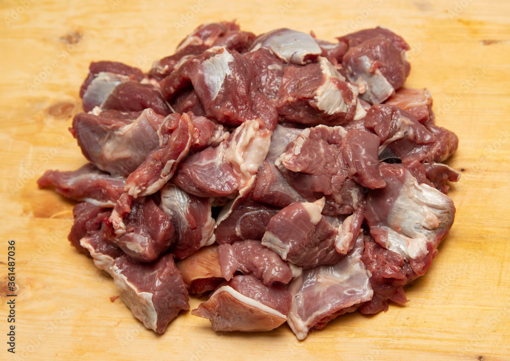 fresh lamb on a wooden background fresh lamb on a wooden background