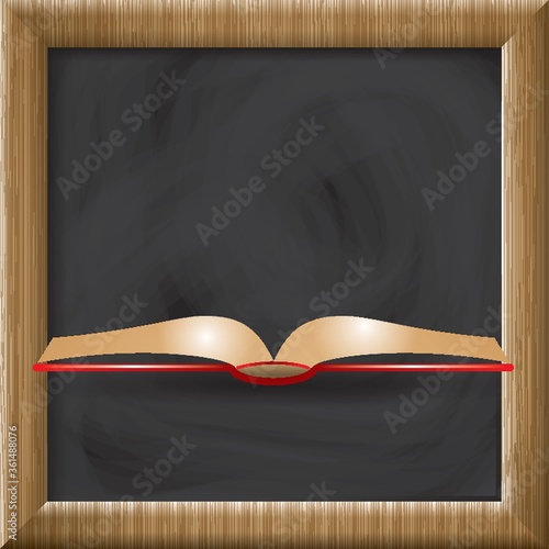 Open book on blackboard