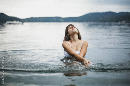 Young woman in the lake