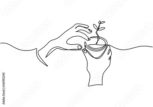 Hand holding plant's pot. Continuous one line drawing of back to nature theme. Growing plant in hand palm. Concept of growing and love earth hand drawn vector design illustration.
