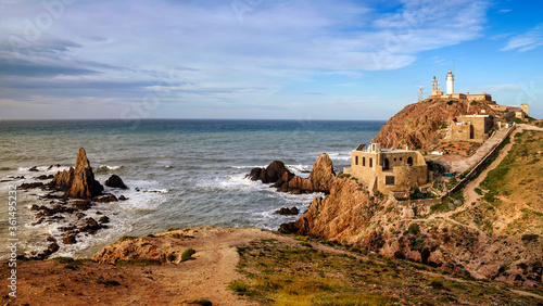 Panoramic view of Cabo de Gata Lighthouse and Las Sirenas Reef at Cabo de Gata-Níjar Natural Park, Almería province, Andalusia, Spain