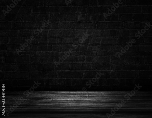 Empty wooden floor with a dark concrete wall background, black brick with space for your text. 3D illustration