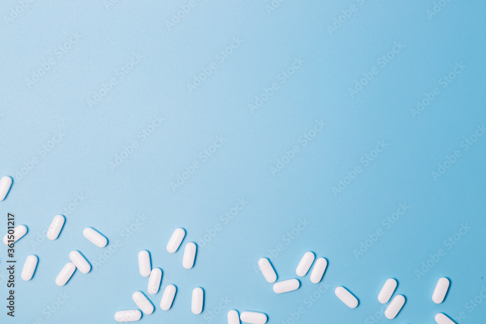 COVID-19 text made with pills and vitamin tablets COVID-19 text made with pills and vitamin tablets
