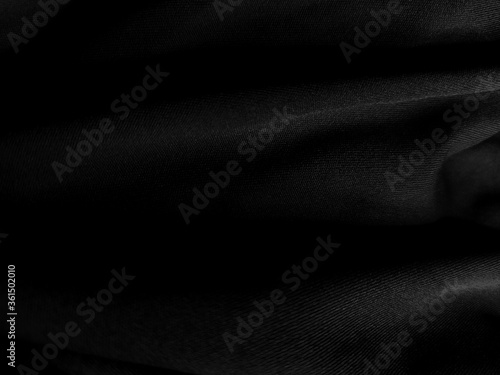 Black fabric texture abstract background luxury. backdrop use for advertising design, food, beverages, technology, scary, horror, halloween, dark