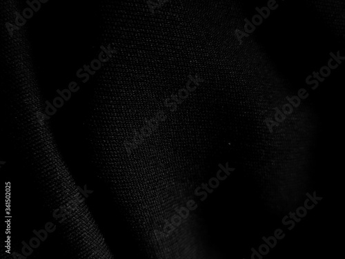 Black fabric texture abstract background luxury. backdrop use for advertising design, food, beverages, technology, scary, horror, halloween, dark