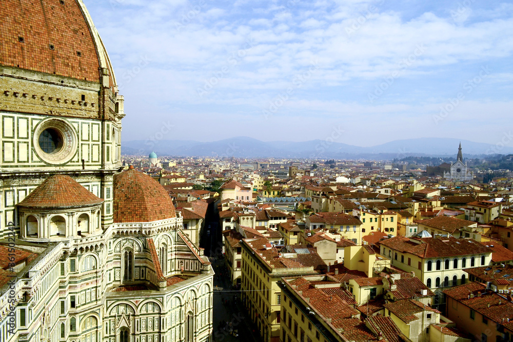 Florence, Italy. 2015. Aerial view of the city landscape from the belltower of the Duomo Santa Maria del Fiore with its great dome in foreground