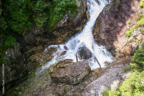 Wodogrzmoty Mickiewicza waterfall in Tatra mountains on Roztoka Stream, Poland. photo