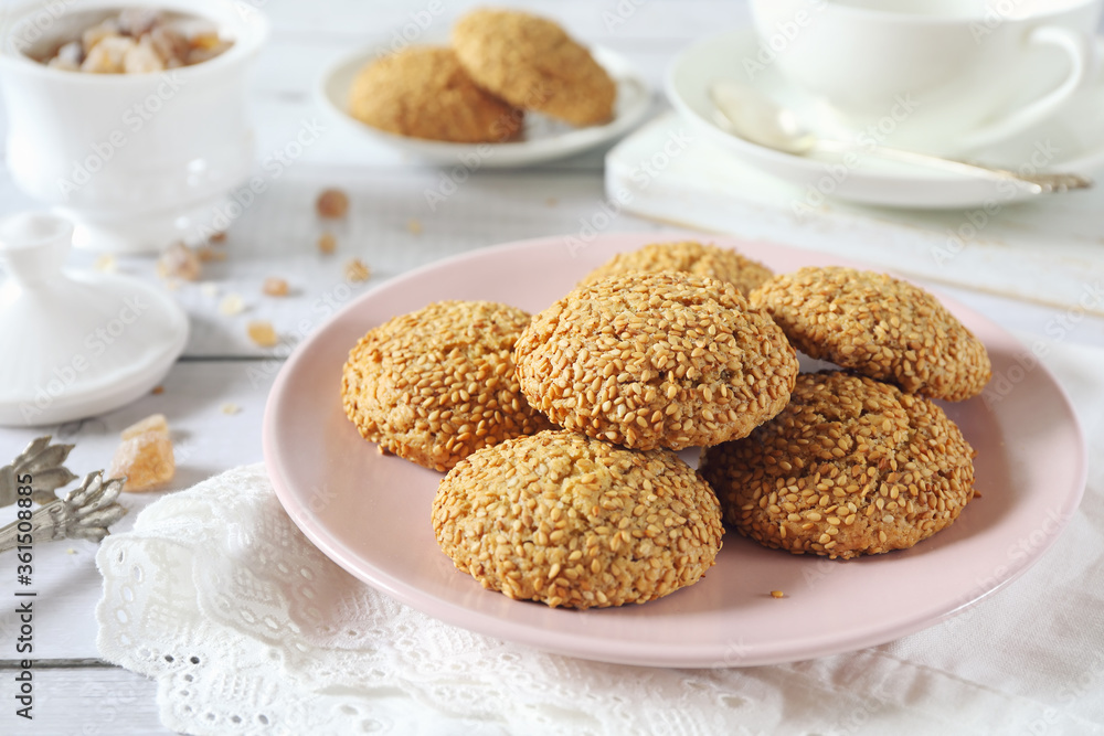 Sesame cookies and cup of tea for sweet breakfast Sesame cookies and cup of tea for sweet breakfast