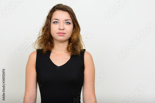 Portrait of young beautiful woman looking at camera