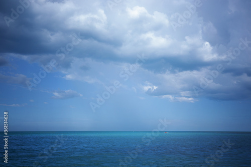 Beautiful landscapes as the sea or lakes with a cloudly blue sky