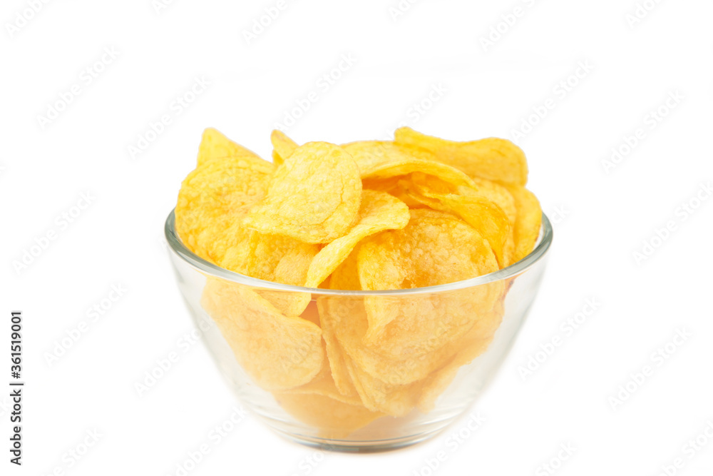 Potato chips on bowl isolated on white background Potato chips on bowl isolated on white background
