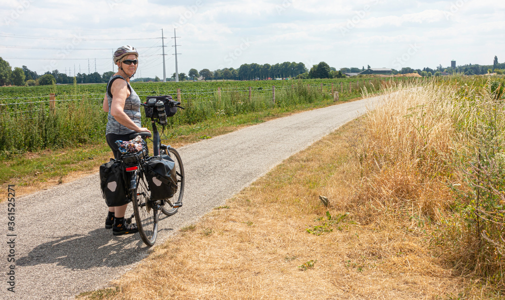 A woman is cycling in the Netherlands 