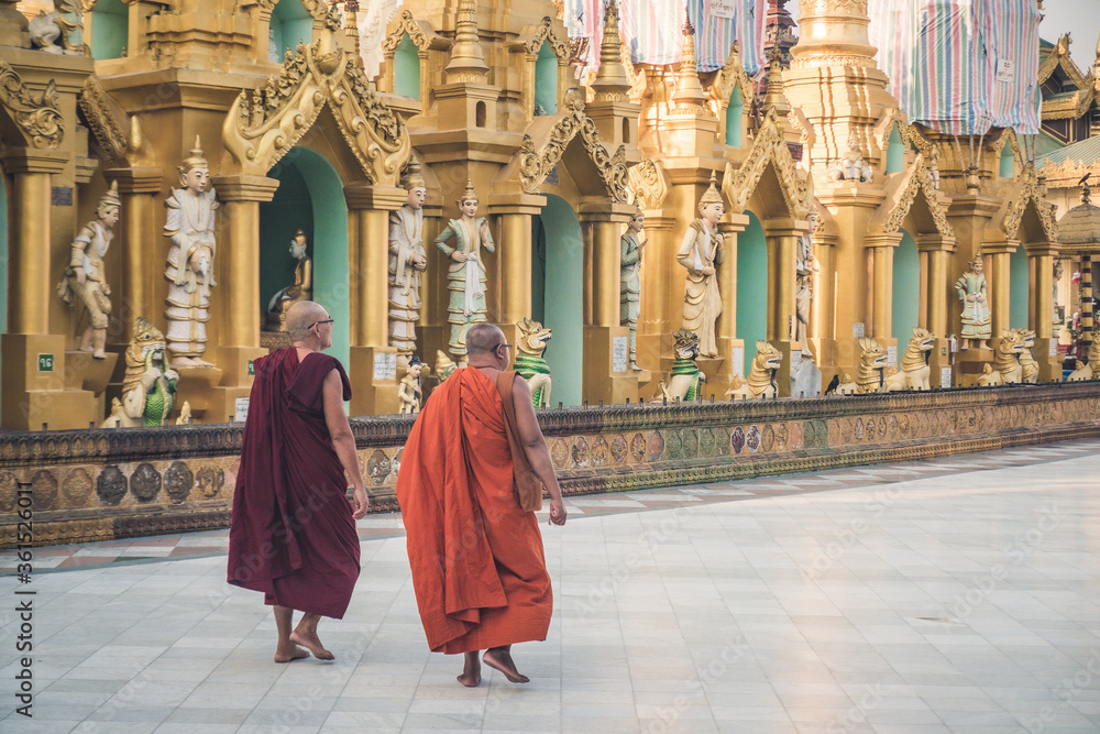 Praying in Schwedagon Pagoda, Yangon Myanmar