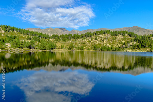 Morning reflections at the lake in the France Pyrenees, Capcir (Cerdanya Province, the Carlit Lakes)