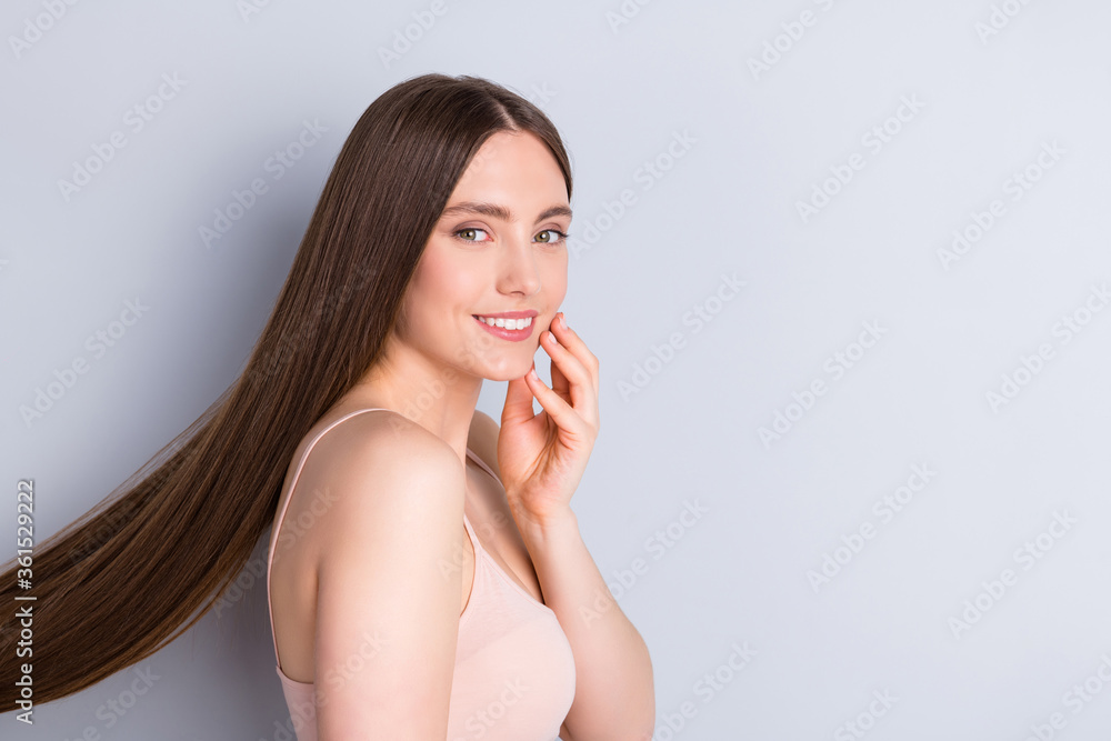 Profile photo of charming appearance model lady demonstrating ideal neat long hairstyle touch hand cheekbone wear beige singlet isolated grey color background Profile photo of charming appearance model lady demonstrating ideal neat long hairstyle touch hand cheekbone wear beige singlet isolated grey color background