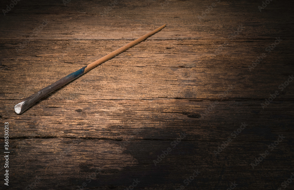 Magic wand on wooden table, Magic wand Wizard tool on vintage wooden background. Magic wand on wooden table, Magic wand Wizard tool on vintage wooden background.