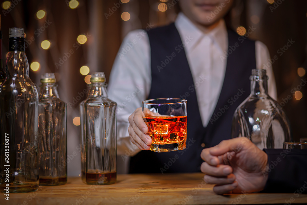 Bartender Serve Whiskey, on wood Bartender Serve Whiskey, on wood