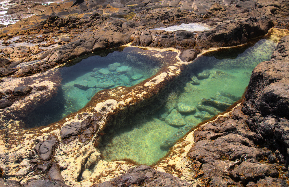 North coast of Gran Canaria, Canary Islands, natural swimming pools in lava fields of Banaderos area