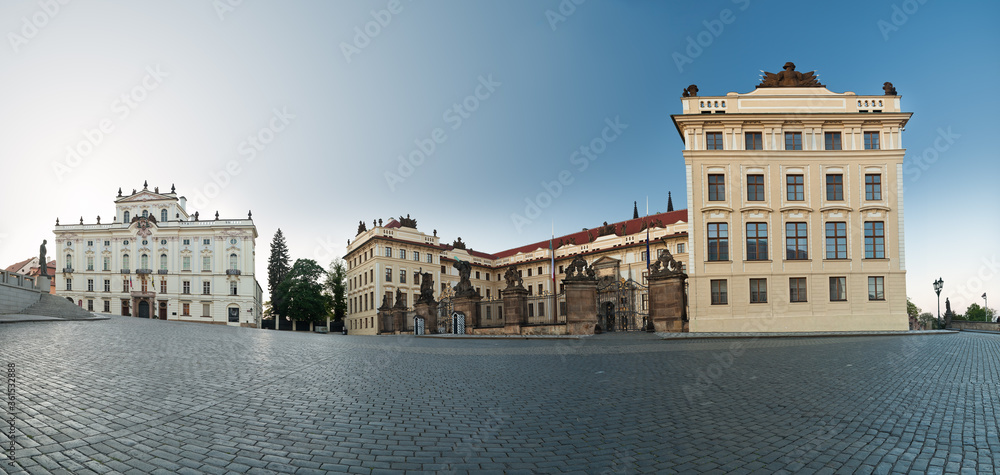 Panoramic view of Hradcanske square with views of Prague castle and Archbishop palace during lockdown with no tourists