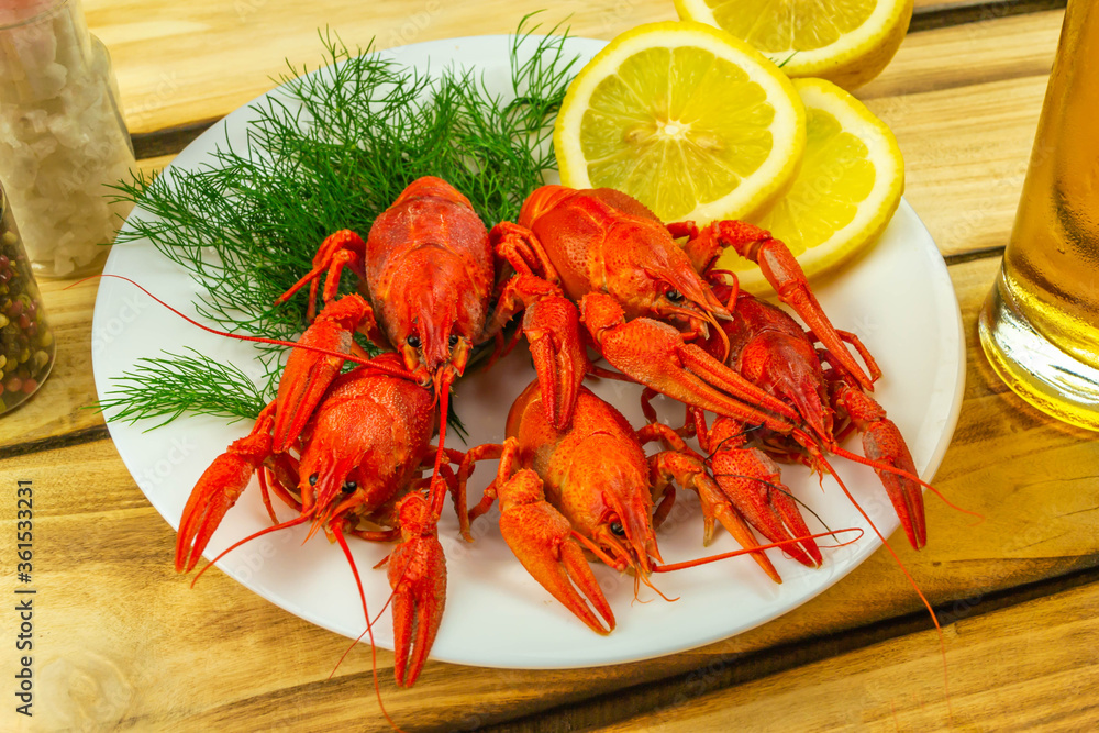 Boiled crayfish boiled ready to eat, wooden background. Boiled crayfish boiled ready to eat, wooden background.