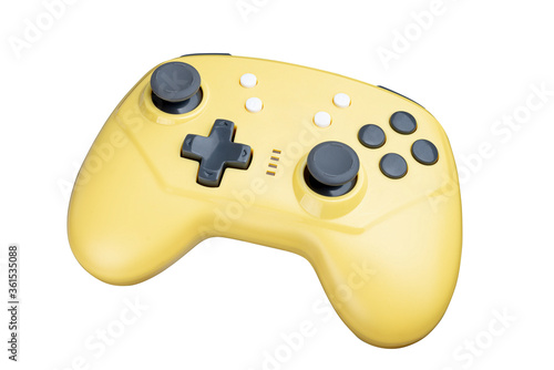 yellow controller for a video game isolated on a white background. Full depth of field.