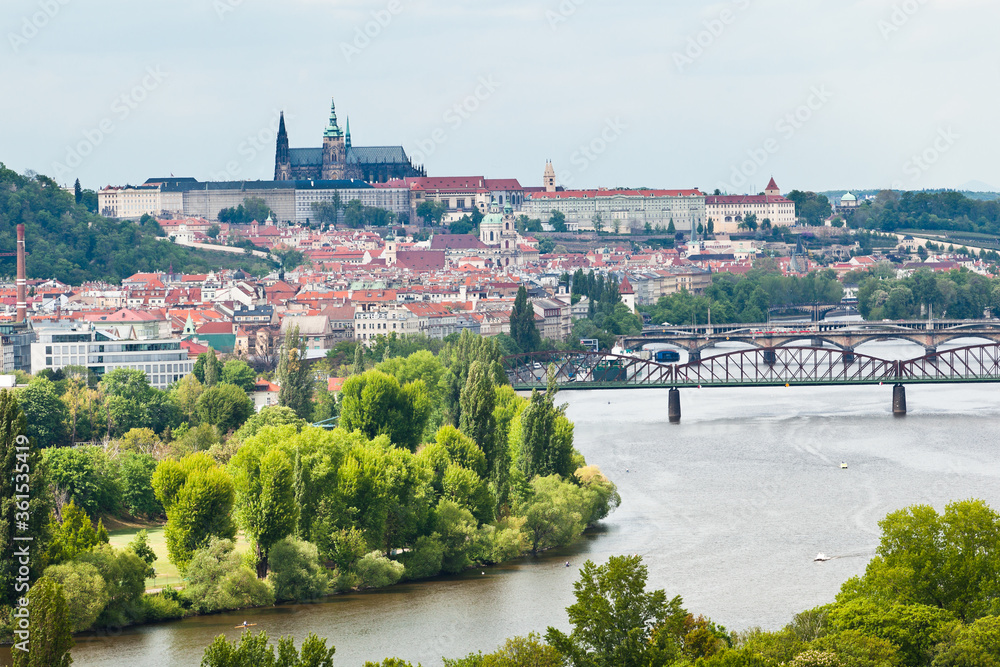 Obraz premium View of Prague castle, Vltava river and the bridges of Prague from distance from the Profile of Podoli