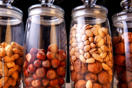 nuts in a glass bowl on a table in the studio