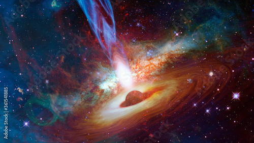 Quasar with jets in the deep space. Elements of this image furnished by NASA photo