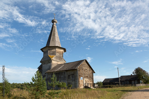 Summer landscape with wooden church, Russia