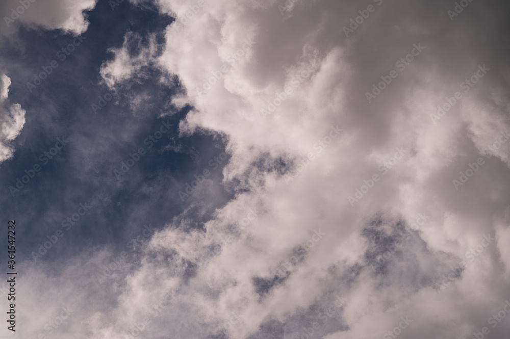 blue background sky and atmospheric white clouds