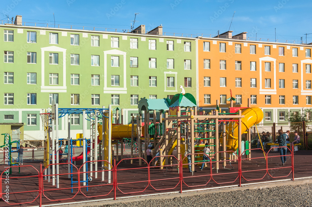Fototapeta premium Coloured apartment houses, Siberian city Anadyr, Chukotka Province, Russian Far East