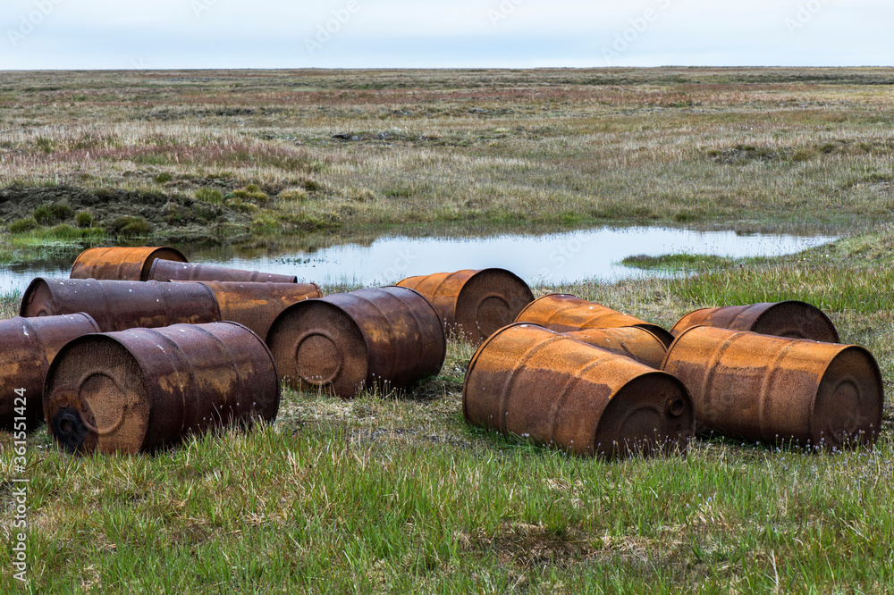 Rusted drums in the tundra, Mammoth River, Wrangel Island, Russian Far East, Unesco World Heritage Site