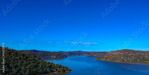 Panoramic drone aerial view of Mooney Money Hawkesbury River in NSW Australia beautiful blue and green colours © Elias Bitar