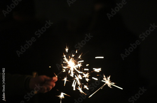 the light of sparklers, out of focus, abstract