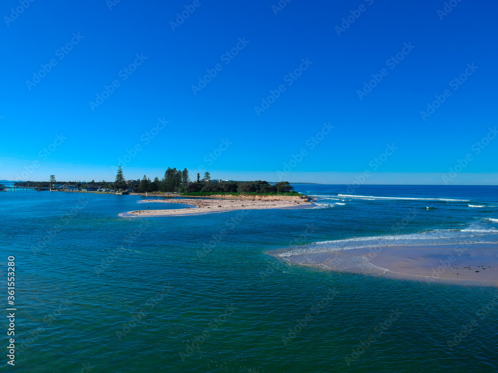 Drone Aerial view of The Entrance NSW Australia blue bay waters great beach and sandy bars