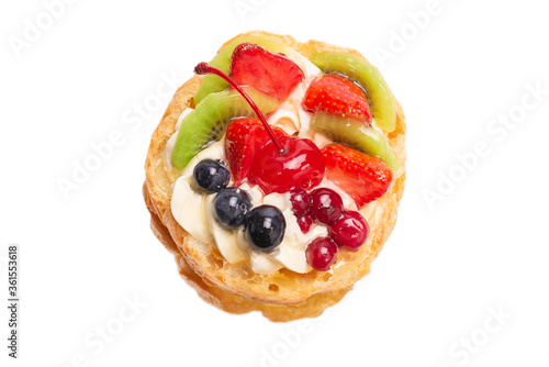 Home made cake with cream and fruits isolated.