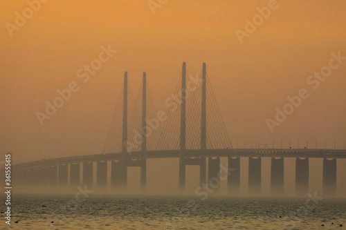 Wallpaper Mural The Oresund bridge in a foggy sunset Torontodigital.ca